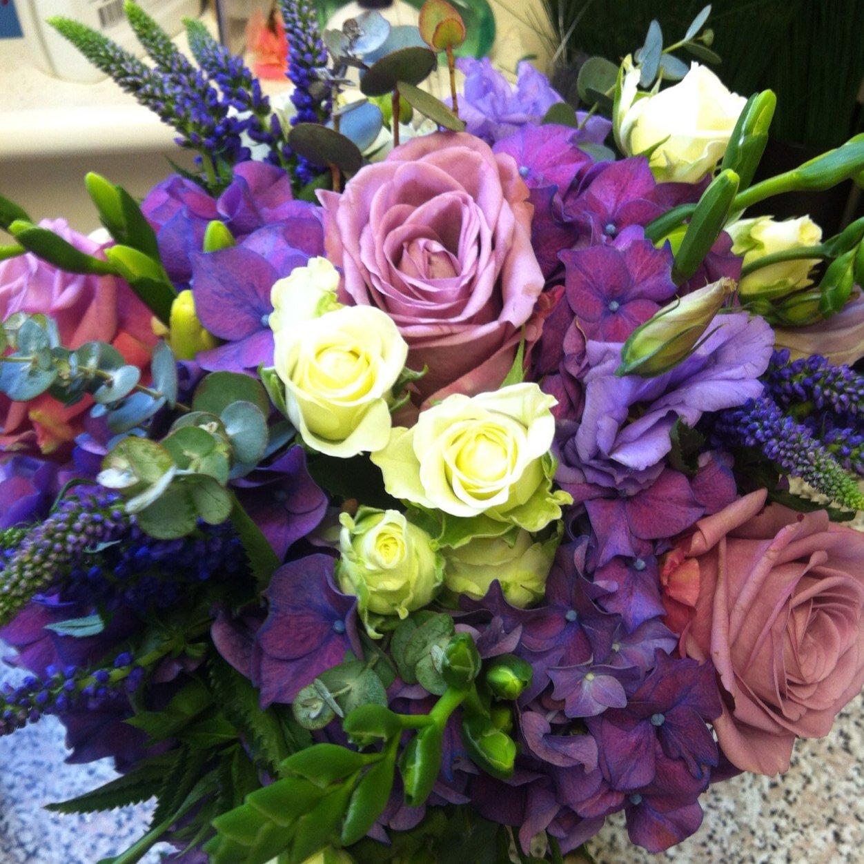 a new florist with a beautiful collection of flowers ranging from traditional bouquets to a contemporary assortment of carefully crafted designs.