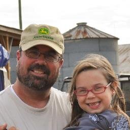 Farmer, works for Georgia Farm Bureau and loves John Deere.