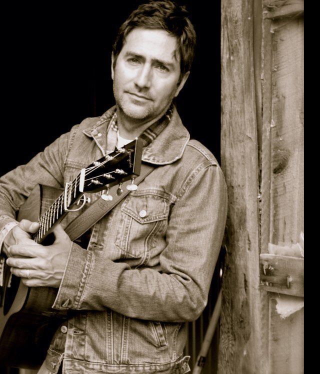 I play guitar with Lyle Lovett and the Dixie Chicks. I love my family. I like old black and white TV shows. I don't like coffee drinks that contain 4+ syllables