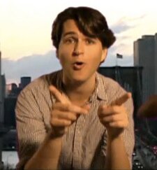 Compliment_Ezra's profile picture. Dearest Ezra, good idea to have a pizza party. We like your jumpsuit. Our boy's got a city to run.