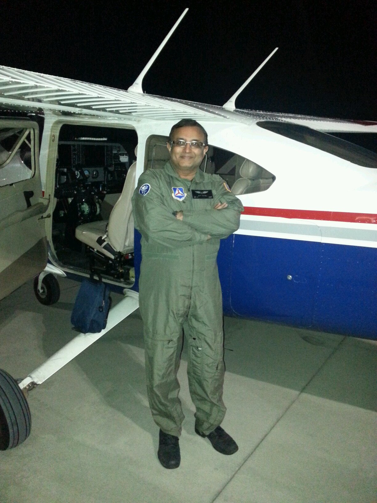 Gm...At Hotel.  Volunteer pilot for Civil Air Patrol.
