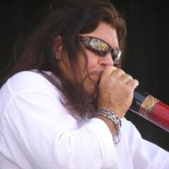 Australian singer/ songwriter/ harmonica/ didgeridoo artist. I perform with my Detroit based band- Midwest Kind