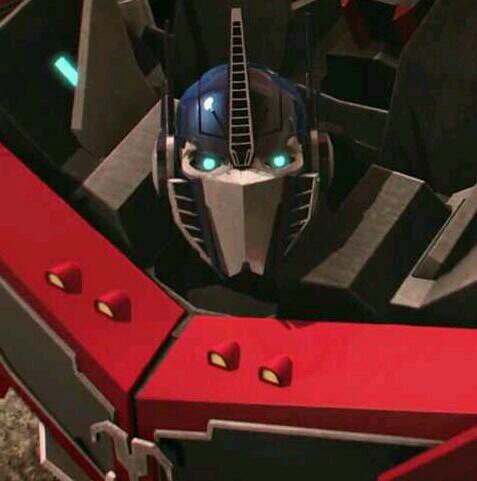 ~I, am Optimus Prime, leader of the autobots, we came from the planet cybertron, which was our home, but destroyed during battle eons ago..~