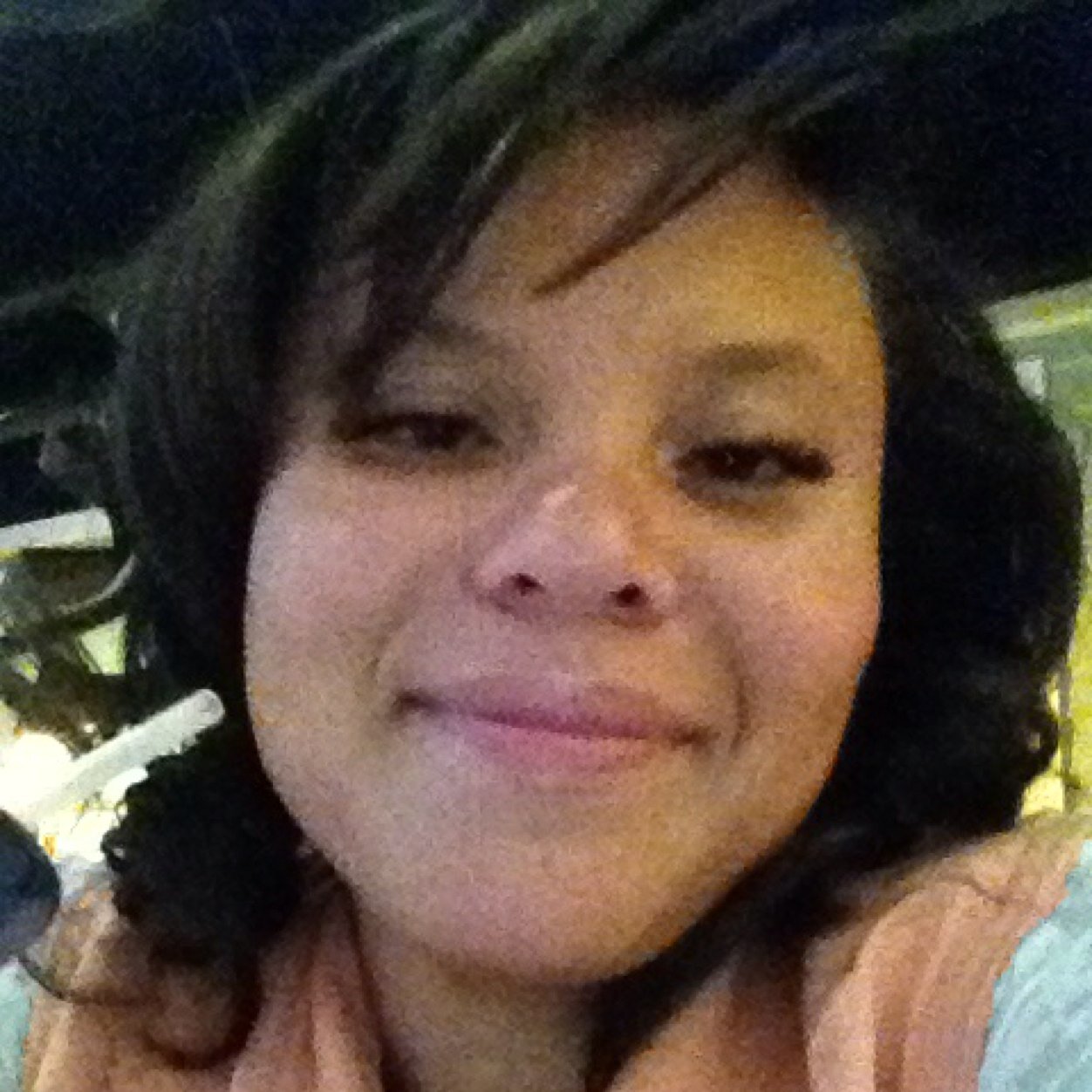 Single mother, hardworking, going to school, young Puerto Rican and Black strong woman.