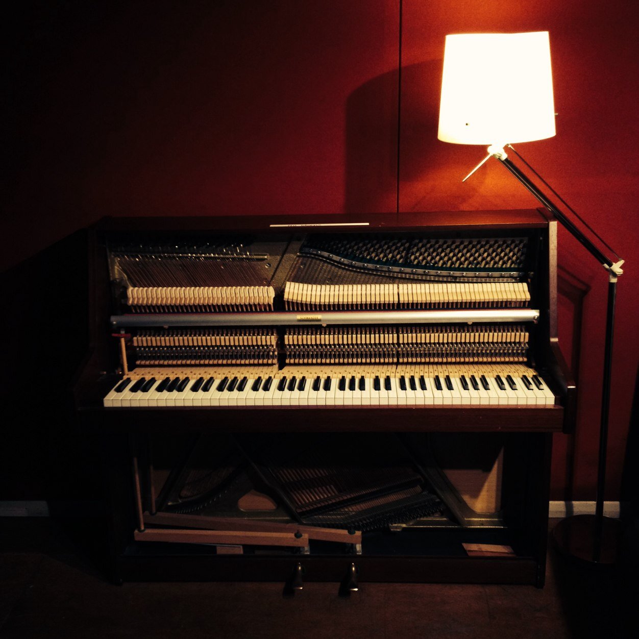 A warm red room to make noise in.