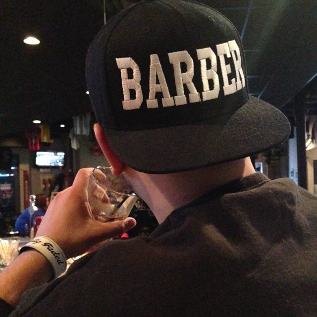 Professional Barber at Rockbrook Village Barbershop. Call 402-391-9994 for appointments.