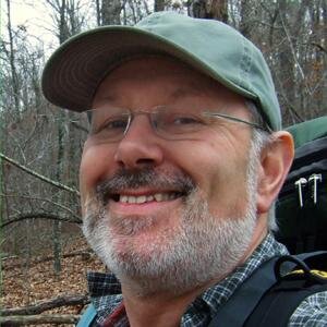 Husband, father, step-father, grandfather, brother, cat wrangler, hiker, backpacker, camper, paddler, photographer, seeker, business adviser and idler.