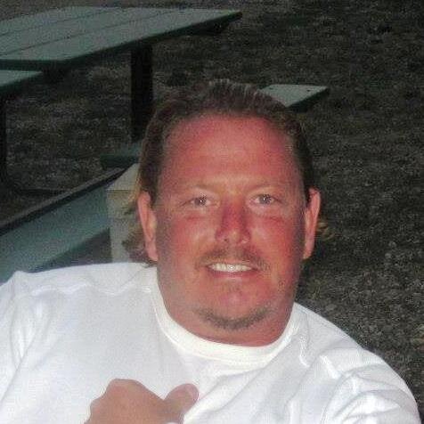 Husband, Bass Player, Harley Rider, Boater, Chicken Wing Expert, retired Junior College Wrestler, Disco lover