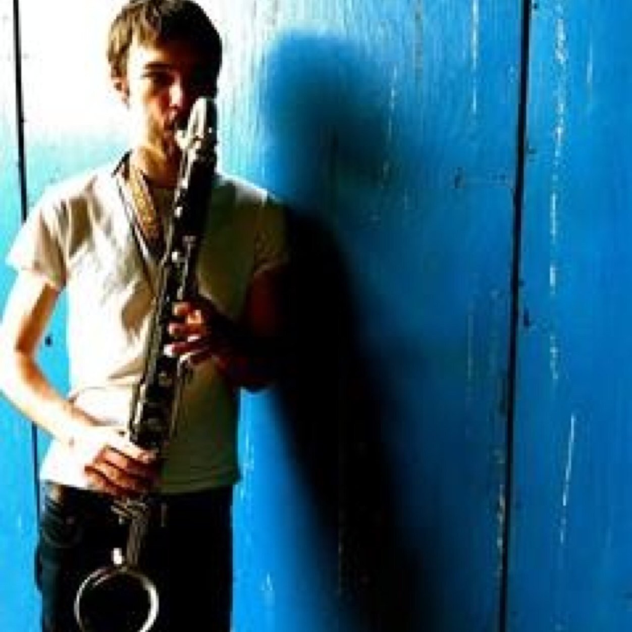 22. NYC. Saxophoning and songwriting and Bass Clarineting.