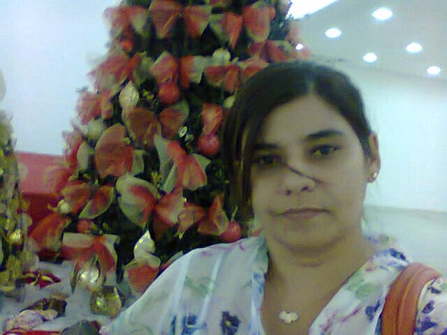 Professora, esposa e mãe.