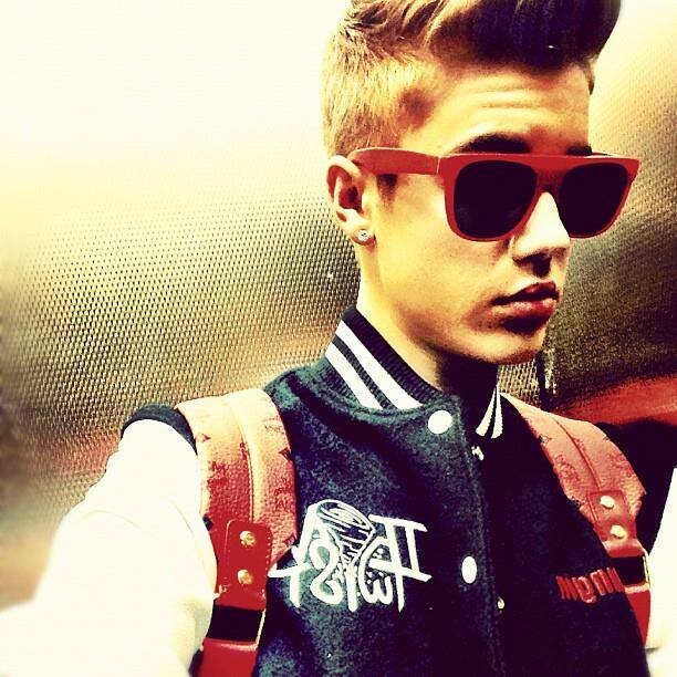 Hi my name is Justin Drew Bieber. I was born March 14, 1994, my favorite color is purple. I like to wear purple, my favorite number is 6. (Hockey team number) b