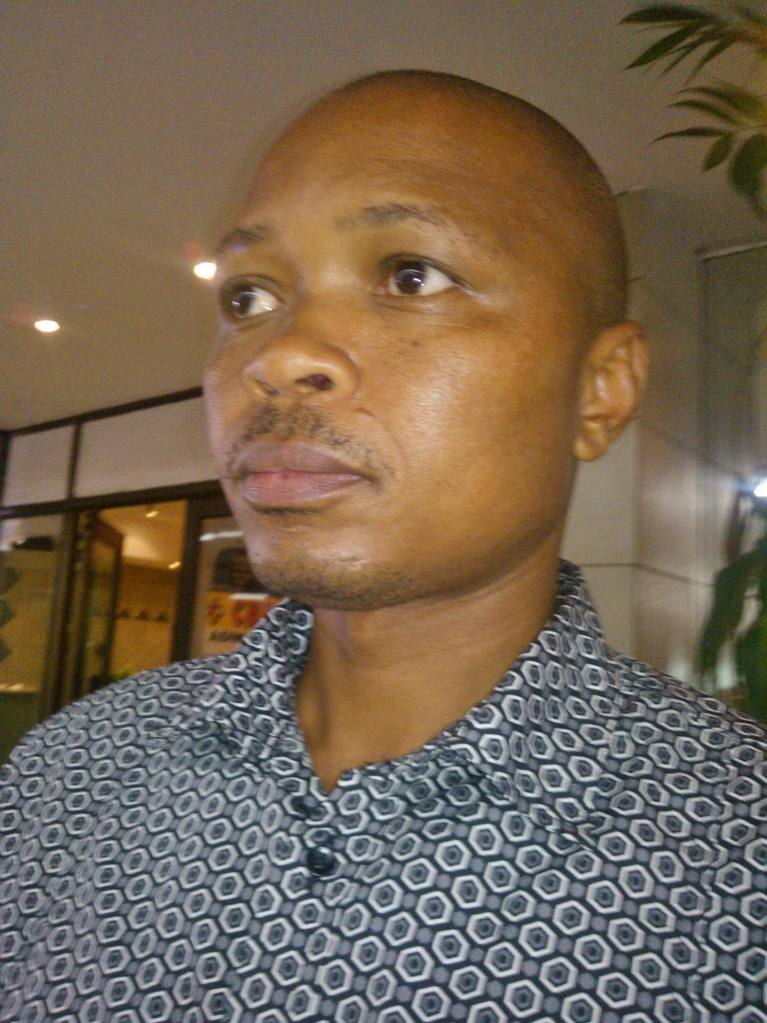 African individual allergic to the bad people, busy with small construction company
