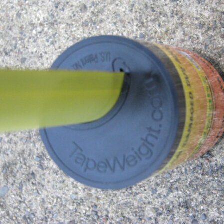 It is a weight that goes on any standard Tape slips on and off very easy check out the you tube video ! Search TapeWeight !