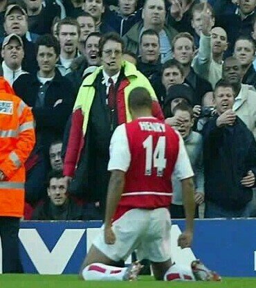 Arsenal fan since 1975, usually somewhere on the North Bank.