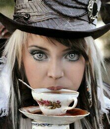 Just a woman with an obsession with hats, tea, and time. Now SWITCH PLACES.