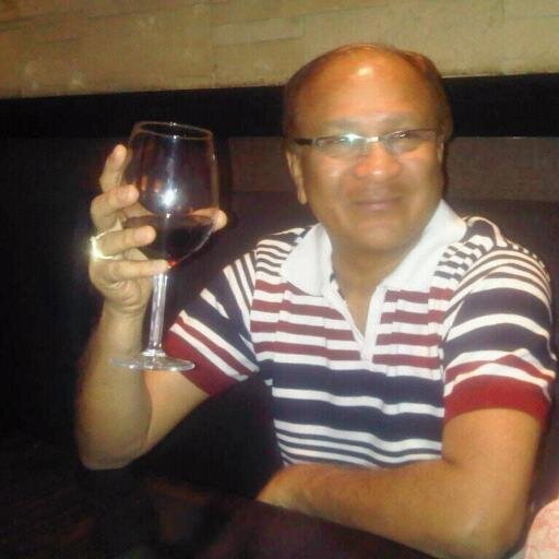 Handsome jovial Man doing own business.