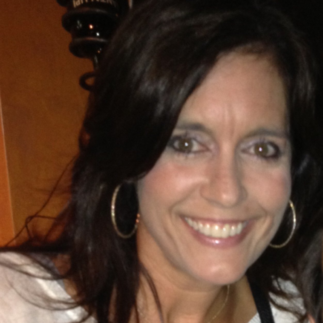 Mom, daughter, sister, friend, tennis player, beach lover, financial coach