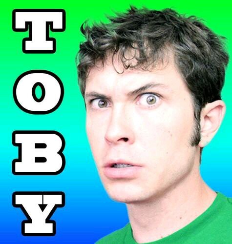 His name is Toby. He also has a last name, too! 

An account for his songs/videos!