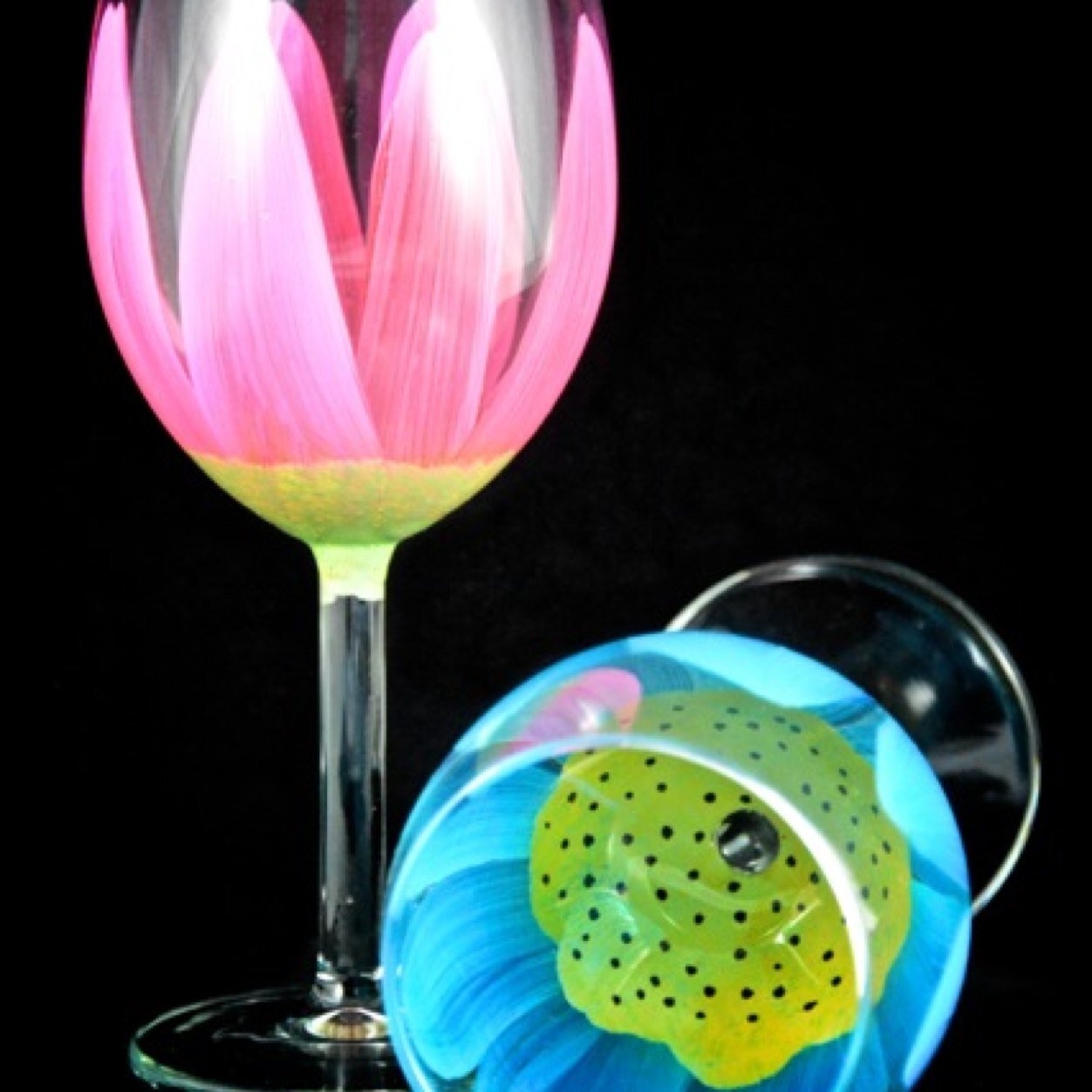 I'm a lampworker and metalsmith, and most recently painter of anything glass...