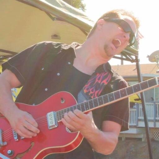Gearhead, guitar-slinger, Dadda, Hubby.