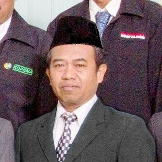 pecinta damai, Guru PAI SMK, aktif di NU,