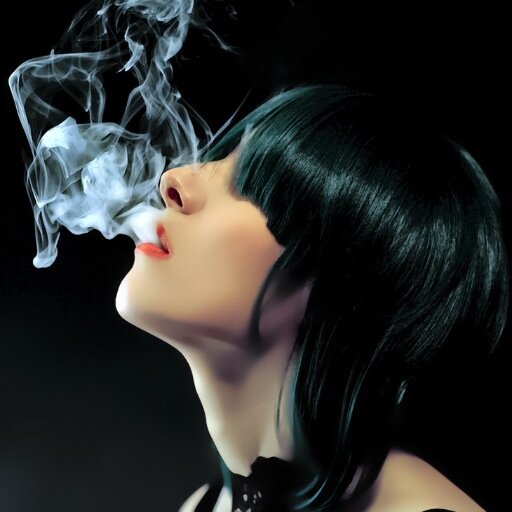 Heelscloudsbass's profile picture. In a sweater drinking tea in heels