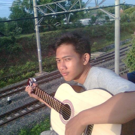 Gitaris Adiyasa