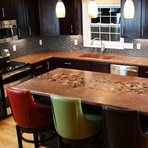 custom concrete counters, back splashes, wall panels, pavers, water fountains, various concrete statues, fire features, yard landscaping, and interior design