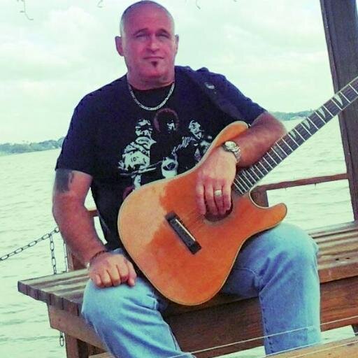 American alt-country/rock/hard rock singer-songwriter. Multi-instrumentalist. Sponsored by Spector Bass Co.