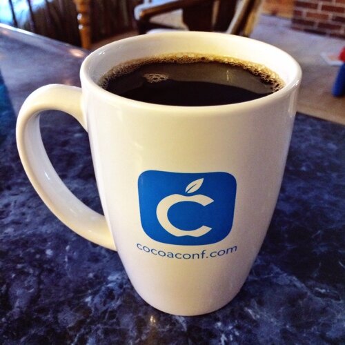 ccmug's profile picture. I’m the mug that everyone wants, but only CocoaConf attendees get. I seem to pop up all over the place and am put to many interesting uses.