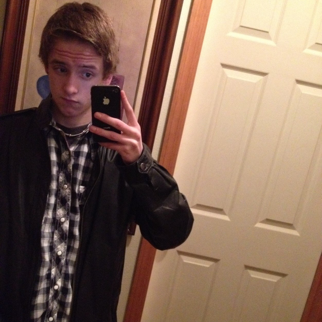 Is 15, loves to draw, plays guitar, and is always listening to music