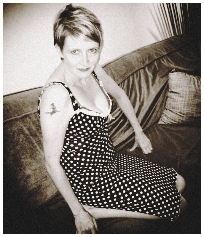 I am a TV writer, a Mom and an awkward couch-sitter.