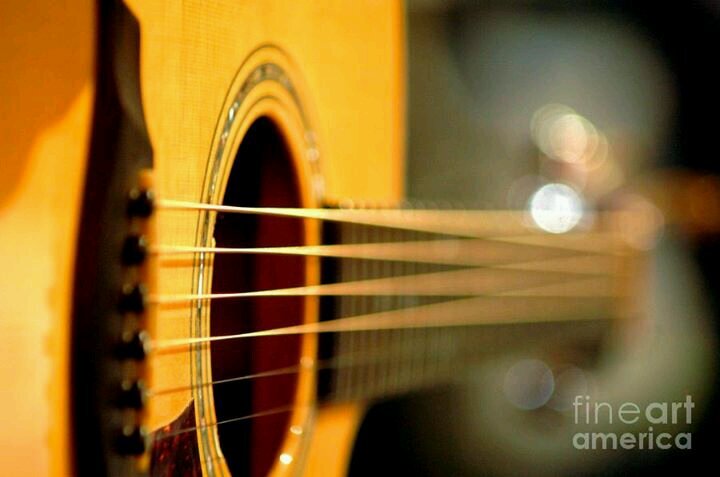 acoustic fingerstyle guitarist