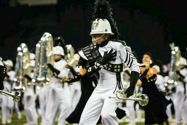 I play trumpet and mello. I love drum corps more than anything. Phantom Regiment!! I also play hockey!!! Caitlyn is my favorite banon 3