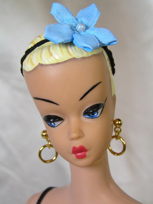 One of a kind doll artist, painter, costume designer, dancer, teacher. lover of all things vintage.
