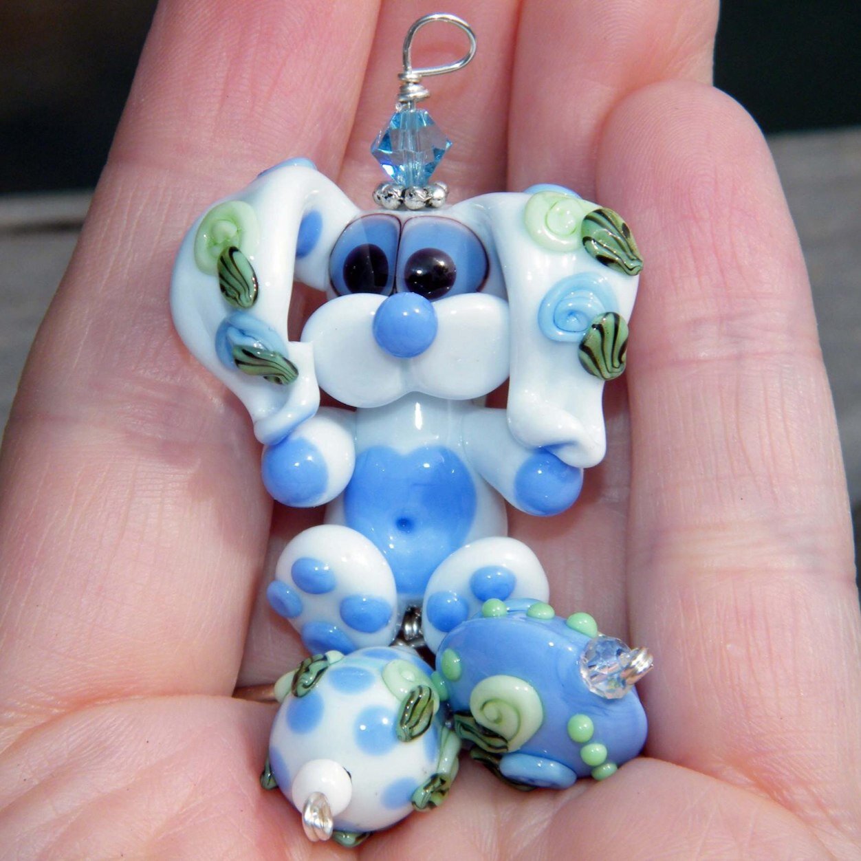 I make lampwork critter beads, and memorial beads. I have been lampworking for over 11 years now. Making beads is a way for me to relax and unwind.
