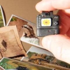 mynewtcameras's profile picture. Tiny personalised replica DSLR cameras - hand made - from scratch - with your favourite shot on the back - it's a small world ...https://t.co/vjDxAzTre0