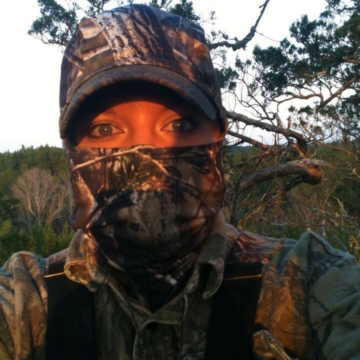 Me: Apparently Unaware Outdoor Enthusiast, Cat-Rubbing Post, Woodland Camo Wearing Hunting Extraordinaire.... Yeah, that sums me up at the moment....