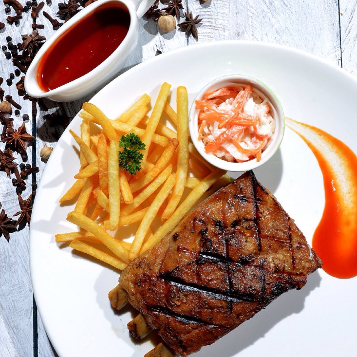 Specialized in Ribs, Western Food, Beverages, Coffee, Tea and Desserts. Widest varieties of Local and Imported Beers, big screen for any big sport events.