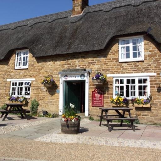 The Windmill Inn is situated in the picturesque village of Badby in Northamptonshire and offers hearty food, a good wine list and a range of cask ales.