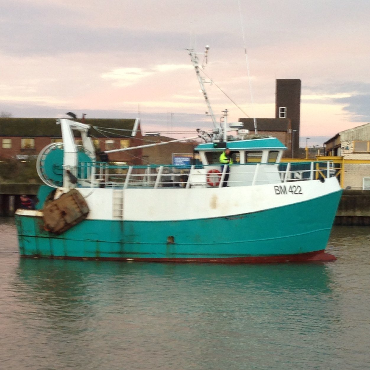 Newman family boat. Father and two sons. Twin rig trawler.