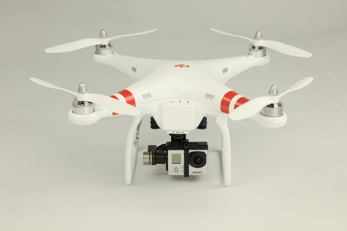 Aerial photographer using a quadcopter drone and GoPro Hero 3. Aerial photos and video at a fraction of the cost of traditional aerial photography.