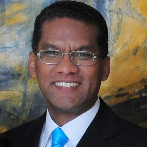 Físico, PhD.  Investigador Titular del IVIC.  Individuo de Número de la Academia de Ciencias Físicas, Matemáticas y Naturales.