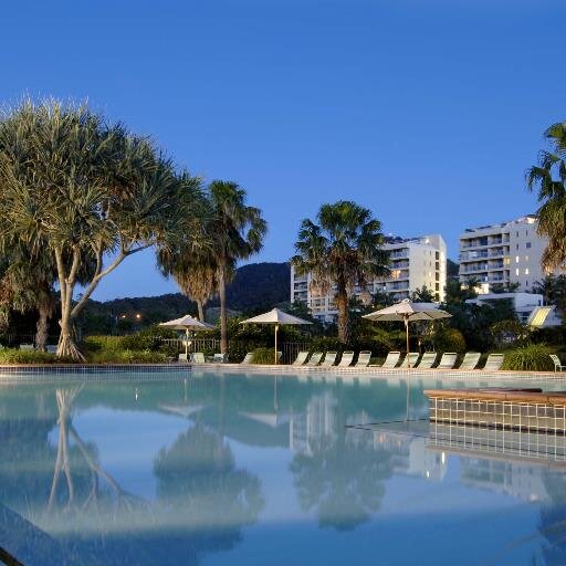 Beachfront location, just north of Coffs Harbour,  framed by ocean, mountains, natural forest and banana plantations.