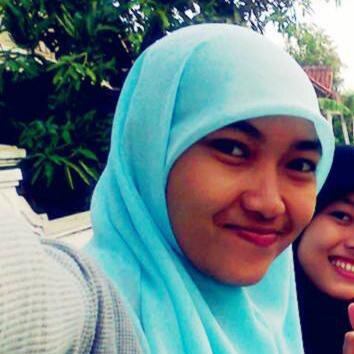 Senyum seorang Muslimah