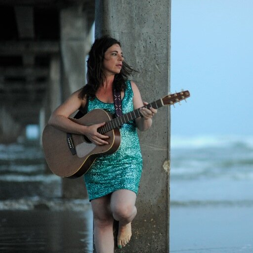 I write songs and sing them to people.
