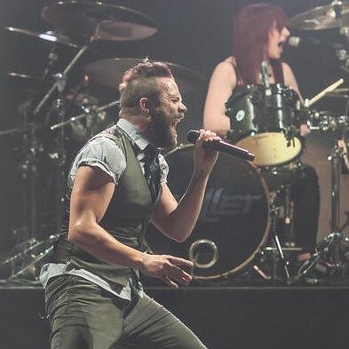 official page of skillet on twitter follow me and I follow