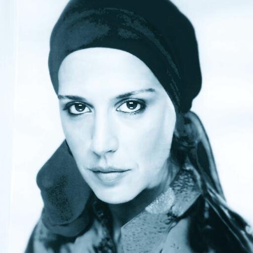 I love  black color
I love the printed scarf
I love the lightness and sensual movement of the fringes
from these passions born my  line of unique accessories