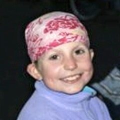 The Pink Bandanas Guild has raised over $150K for pediatric brain tumor research at Seattle Children's Hospital in honor of their friend Sara