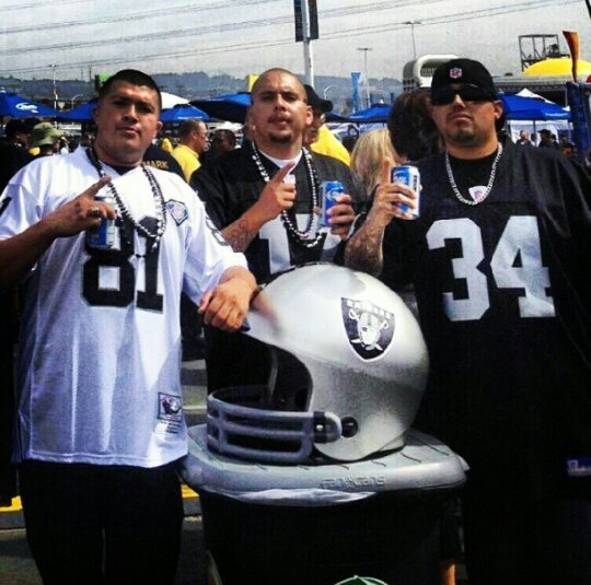 family, lowriding, building show cars, playing b - ball, oakland raiders, la lakers,